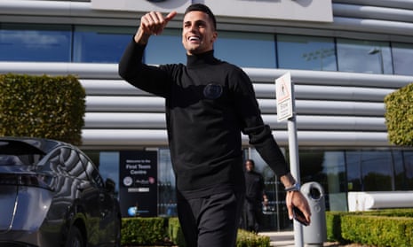 Joao Cancelo boards the team bus to the airport ahead of Manchester City’s match against FC Copenhagen