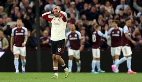 Dominik Szoboszlai of Liverpool shows a look of dejection after his slip led to Ollie Watkins of Aston Villa scoring a goal to make the score 2-1.