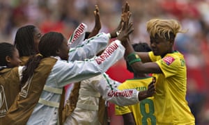 Cameroon forward Gaëlle Enganamouit, right, celebrates her second goal against Ecuador at the World Cup in Canada in 2015.