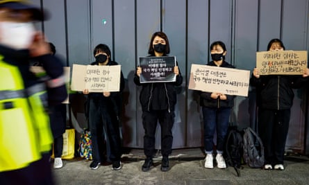 Young people from progressive organisations and political parties hold a silent protest in front of the site of the Itaewon disaster