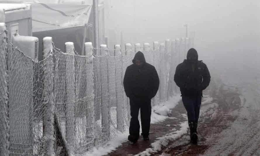 Migrants near border fence