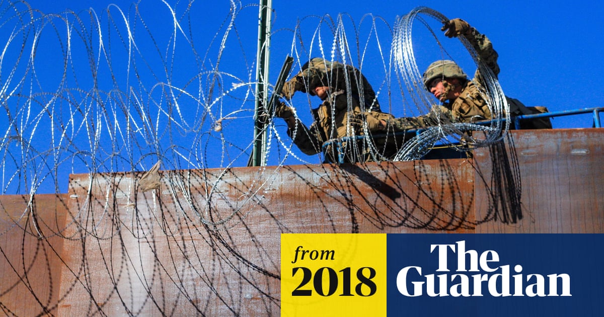 US toughens border as first members of migrant caravan reach Tijuana