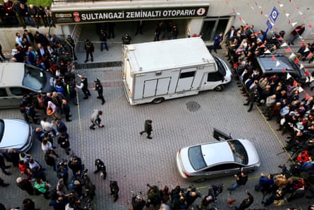 Turkish crime scene investigators arrive at a carpark in Istanbul’s Sultangazi district.