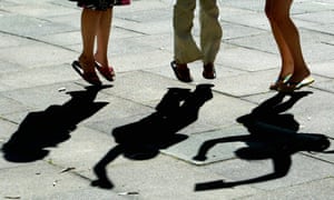 Legs jumping - shadows shown holding papers