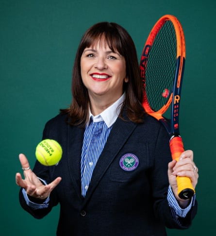 Eyre poses for a picture with a tennis racket and ball