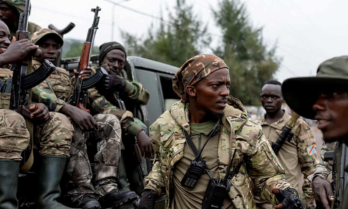 Rwandan-backed M23 rebels in Goma in January. Sources say mass graves were dug for RDF troops killed in fighting in DRC but Rwanda denies any role.