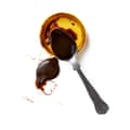 Some Marmite, yesterday, messily placed on a Marmite jar top.