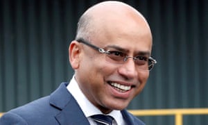 Liberty Steel’s Sanjeev Gupta smiles outside its processing mill in Dalzell, Scotland, in 2016.