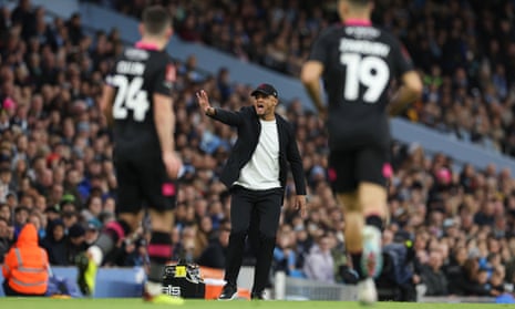 Vincent Kompany issues instructions to his Burnley players at the Etihad.