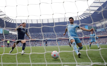 Ilkay Gundogan scores the third Manchester City goal which won the game and the Premier League title during the Premier League match between Manchester City and Aston Villa at the Etihad Stadium on May 22nd 2022.