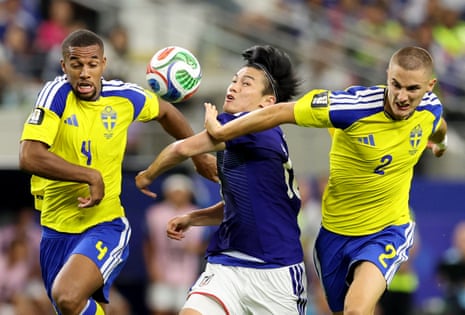 Isak Hien goes into the book for a foul on Ayase Ueda.