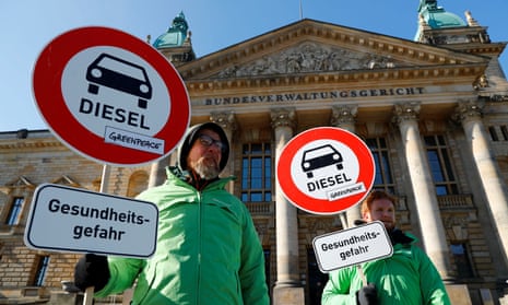Greenpeace activists outside court in Leipzig