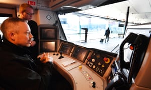 A driver in a self-driving train after pressing the automatic train operation button on the service from St Pancras to Blackfriars in central London.