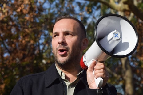 Green Party leader Zack Polanski speaks through a megaphone during his by-election campaign in St Martin's Gardens in Camden.