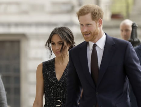 Britain's Prince Harry and his then-fiancee Meghan Markle attend a Memorial Service to commemorate the 25th anniversary of the murder of black teenager Stephen Lawrence at St Martin-in-the-Fields church in London.