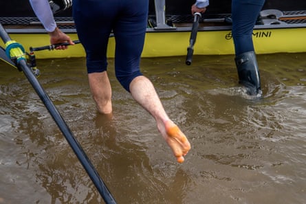 Rowers boarding boat