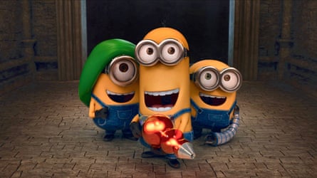 Three Minions, one wearing a green beret and one with an orange space gun