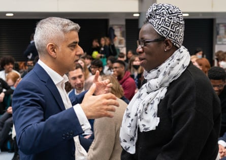 Mayor of London Sadiq Khan meets air pollution campaigner Rosamund Kissi-Debrah, whose 9 year old daughter, Ella Roberta, died after a series of asthma attacks linked to air pollution, during a visit to Forest Hill school in south London, March 2022