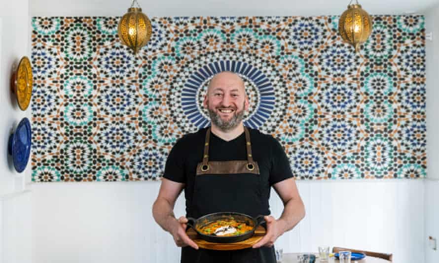 Tarik Abdeladim, chef/owner of Los Moros Algerian restaurant in York, with his signature dish, merquez and butter beans