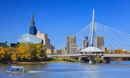 The Canadian Museum for Human Rights (left) and Esplanade Riel Bridge in Winnipeg, Canada.