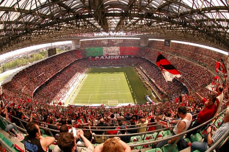 Fans enjoy the atmosphere in the stadium