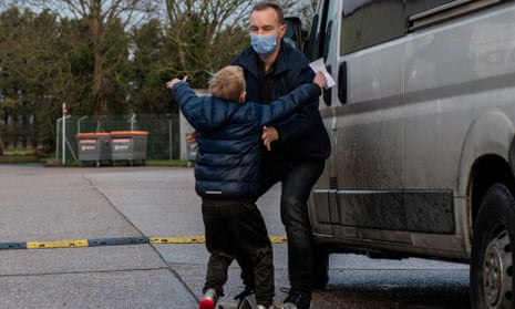 Tom Hayes is greeted by his son after being released from Ford open prison in West Sussex. 