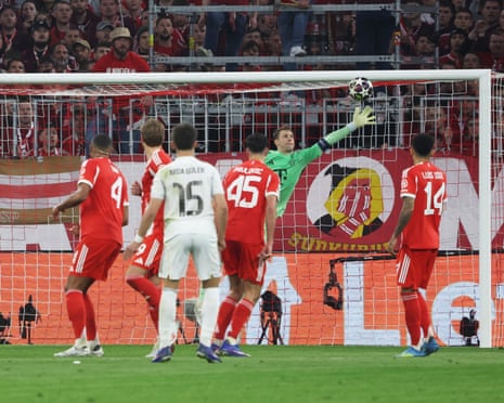 Manuel Neuer attempts to reach the free-kick from Real Madrid’s Arda Güler (15) …
