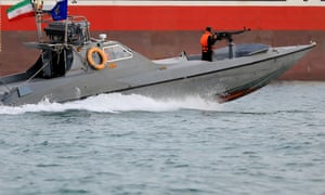 Iranian Revolutionary Guards in a speedboat alongside the British-flagged oil tanker Stena Impero, which was seized in the strait of Hormuz in July
