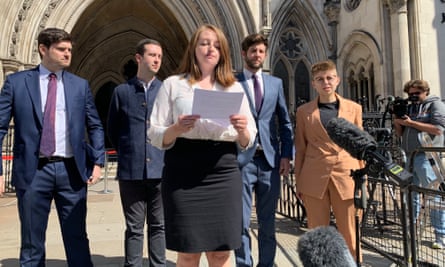 The Labour party whistleblowers outside the high court in London. Martha Robinson reading statement. Back row left to right: Dan Hogan, Ben Westerman, Sam Matthews, and Louise Withers Green