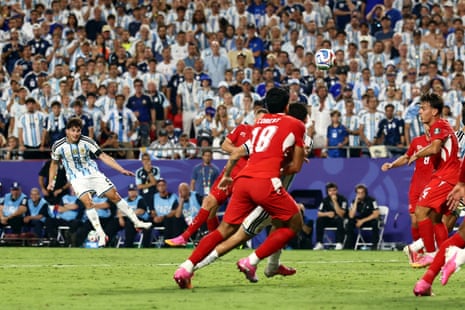 Argentina’s Julian Alvarez curls in the second