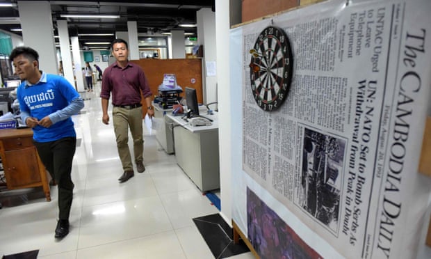 Reporters at the English-language newspaper Cambodia Daily shortly before it was due to close.