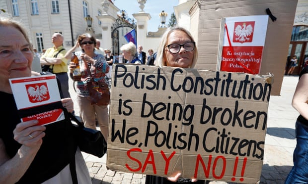 Protesters against the supreme court changes in front of the Presidential Palace in Warsaw.