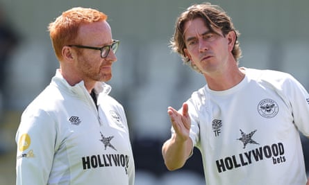 Thomas Frank the Brentford manager, talks with Ben Ryan, the director of elite performance