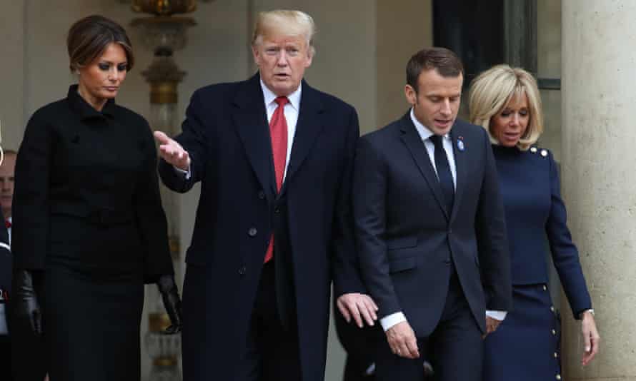 Donald and Melania Trump with Emmanuel Macron first lady Brigitte Macron on 10 November.