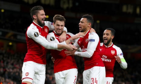 Arsenal’s Mathieu Debuchy, centre, is congratulated on his goal by Olivier Giroud, left, Theo Walcott, right, and Francis Coquelin.