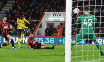 Bukayo Saka scores for Arsenal against Bournemouth in the FA Cup.