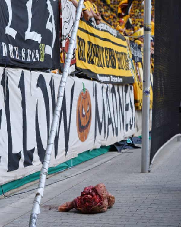 Supporters of Dynamo Dresden threw a severed bull’s head onto the side of the pitch during a game.