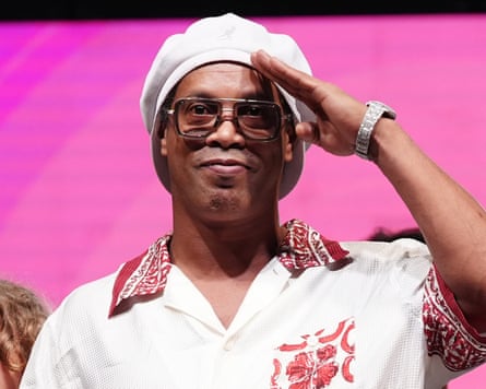 Ronaldinho salutes onlookers at his unveiling