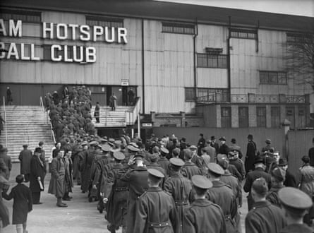 British soldiers on leave, queuing outside White Hart Lane, before a match between Arsenal and Chelsea in March 1940. Spurs and Arsenal had to groundshare at White Hart Lane as Highbury had been requisitioned as an ARP (Air Raid Precautions) centre.