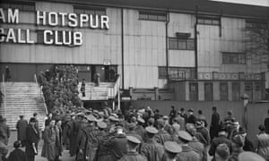 British soldiers queue outside White Hart Lane before a match between Arsenal and Chelsea in 1940.