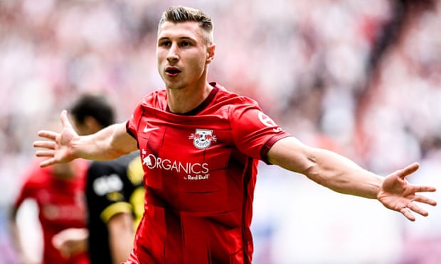 European football: Bayern held by Stuttgart, Dortmund lose at Leipzig | European club football 1 RB Leipzig’s Willi Orban celebrates scoring his side’s opening goal against Borussia Dortmund.