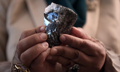 A member of the Botswana cabinet in Gaborone holds the 1,174-carat diamond