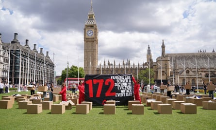 Activists from Shelter stage a protest in Parliament Square, London, last July.