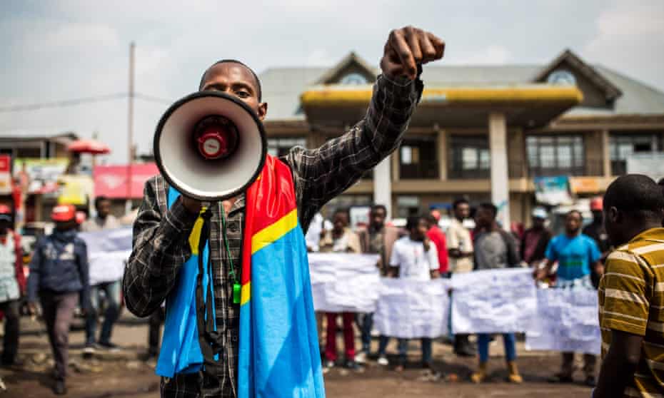 A Lucha supporter speaks during a demonstration at Virunga market in Goma