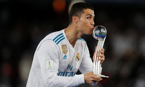 Real Madrid’s Cristiano Ronaldo gives his silver award a big smacker.