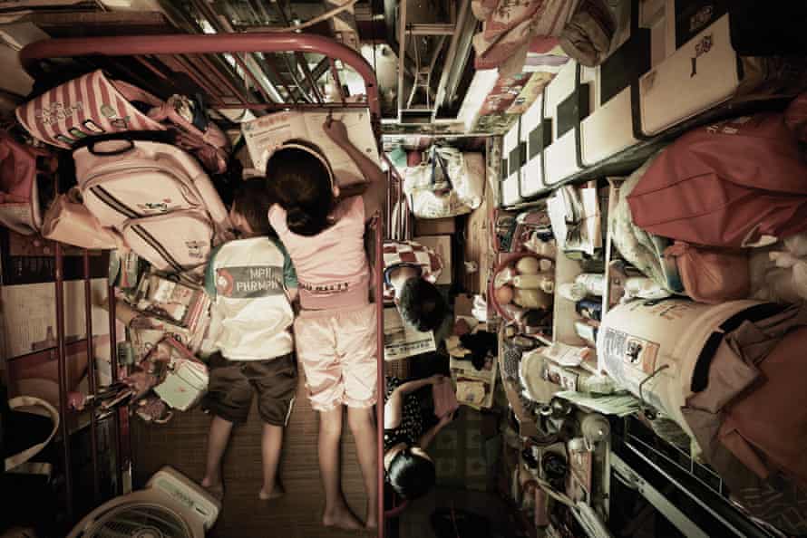 Crammed in … a photograph of Hong Kong life from Benny Lam’s Trapped series.