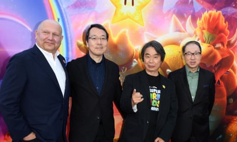 Ground Theme Nintendo music composer Koji Kondon, right, with other team members at Universal’s The Super Mario Bros. Movie special screening earlier this month. 