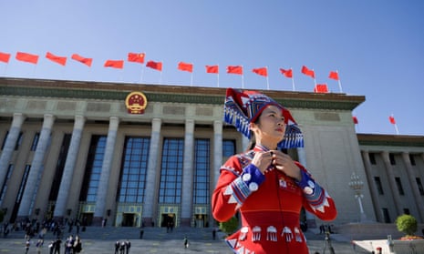 A delegate leaves after the closing ceremony