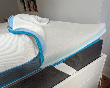 The Simba mattress topper is unzipped and layers visible.