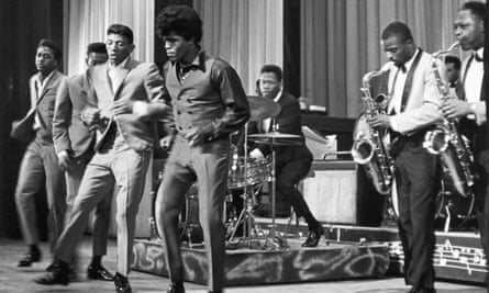 James Brown and the Famous Flames at the Apollo theatre, New York, in 1964.